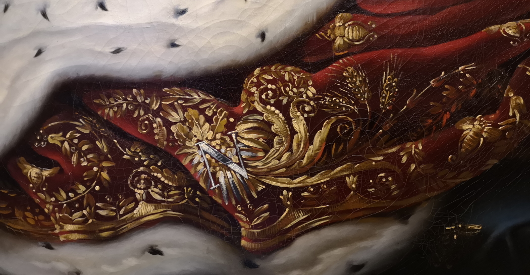 : François Gérard, Napoleone con gli abiti dell’incoronazione, olio su tela, 1805 (Ajaccio, Palais Fesch-Musée des Beaux-Arts. © Reunion des Musees Nationaux – Grand Palais). Particolare del mantello con le api dorate. : François Gérard, Napoleone con gli abiti dell’incoronazione, olio su tela, 1805 (Ajaccio, Palais Fesch-Musée des Beaux-Arts. © Reunion des Musees Nationaux – Grand Palais). Particolare del mantello con le api dorate.