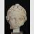 Testa colossale di divinità femminile con larga benda intorno ai capelli, raccolti sul retro eannodati sulla sommità. Le labbra erano riportate probabilmente in marmo diverso colorato - Rinvenuta nel 1937 (n. 142); già Antiquarium n. 2340 - Altezza cm 33,5, larghezza cm 31, profondità cm 28; marmo bianco a grana fine - Musei Capitolini, Palazzo Nuovo, Magazzino sculture, inv. S 3020