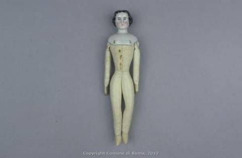 Bambola in porcellana lucida con corpo in pelle raffigurante bambina 